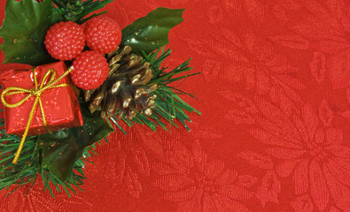 Christmas decoration on a red seasonal fabric