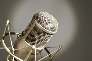Microphone in studio on a light background.