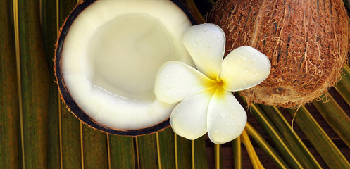 spa beauty exotic tropical flowers coconuts on palm leaf