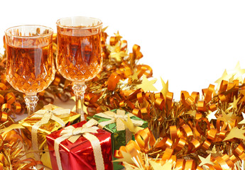 Colorful Christmas gift boxes with ribbons, golden tinsel