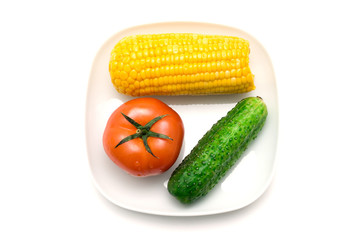 Vegetables: tomatoes, cucumbers and corn.