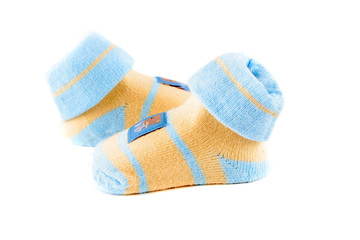 little baby socks with teddy bears on a white background