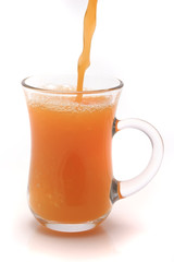 little glass full orange juice