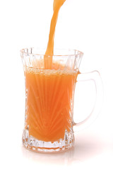 little glass full orange juice