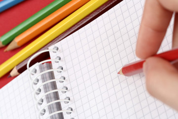 Close-up of pencil and agenda