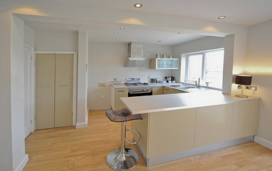 colour image kitchen in newly restored rebuilt house
