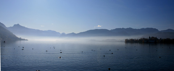 mountain landscape, lake and fog, mist, sun