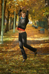 Beauty girl in a park in autumn