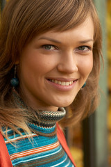 Fototapeta premium Beauty girl in a park in autumn