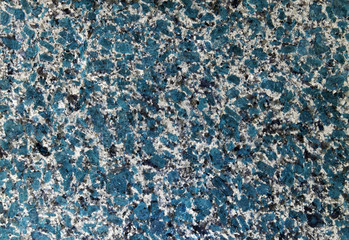 Abstract unreal futuristic blue granite wall.