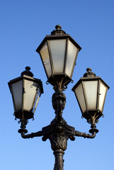Fototapeta na wymiar Nlack iron lantern on the street, Moscow, Russia