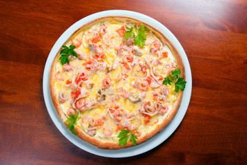 Tasty Italian pizza  on plate.Italian kitchen