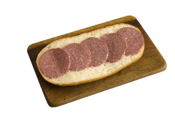 Sandwich on cutting board isolated on white