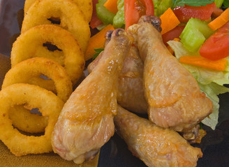 Chicken Legs, Onion Rings and salad