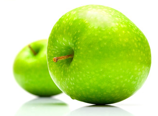 Green apples on the white background. Isolated.