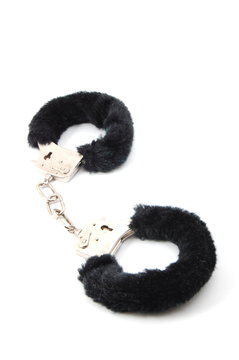 some handcuffs isolated on a white background