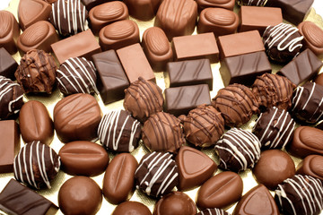 close up shot of chocolates on white background