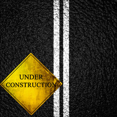 Asphalt background texture with some soft shades and spots