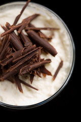 Closeup of the top of chocolate trifle with chocolate shavings