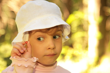 Little girl with wild berry