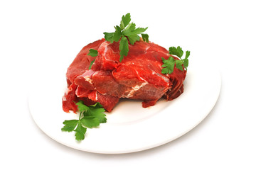 red raw meat and parsley
