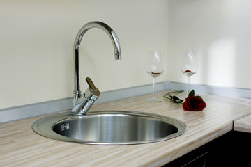 the kitchen interior (faucet )close-up photo