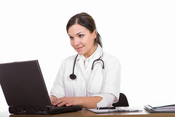 attractive brunette woman at desk. over white background