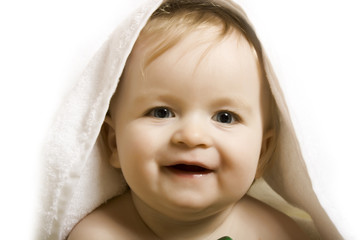 Baby after bath. Cheerful child