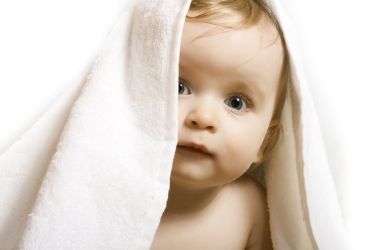 Baby after bath. Cheerful child