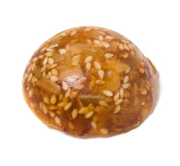 Caramel sweets with sunflower seeds isolated on white