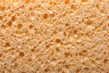 Close up of a yellow cleaning sponge