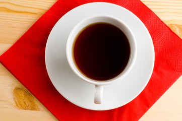 white cup with hot beverage