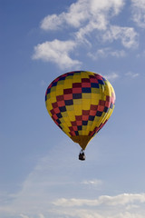 A vertical image of a hot air balloon