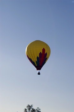 A vertical image of a hot air balloon.