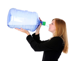 Portrait of young businesswoman drinking water