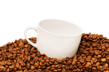 Cup and coffee beans isolated on the  white.