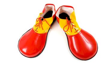 A pari of oversized red and yellow clown shoes