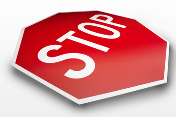 Red and white stop sign on white background