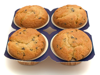 four muffins isolated on the white background