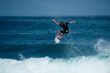 surfer doing big ariel