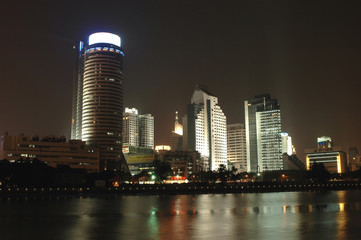 Obraz premium Ningbo - night cityscape with river and skyscrapers
