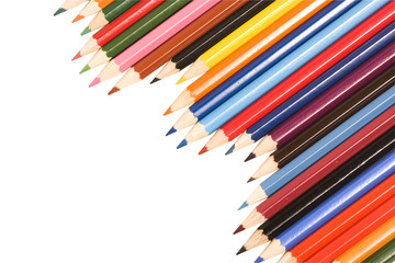 Assortment of colored pencils on white background