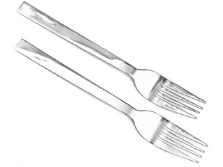 two silver forks against the white background