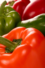 Fresh peppers in different colors close up
