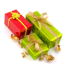 Christmas presents wrapped in red and green glossy paper