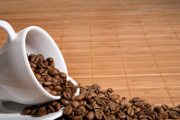 Cup with coffee grain, costing on coffee grain