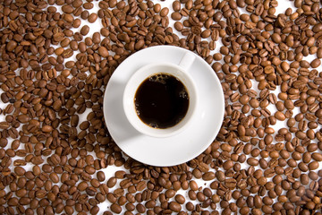 Cup with coffee, costing on coffee grain