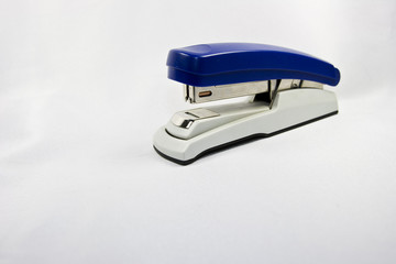 blue stapler isolated on white background