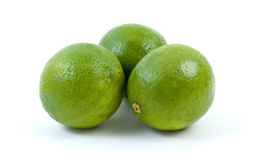 Three limes isolated on the white background