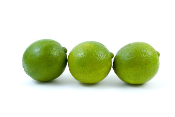 Three limes isolated on the white background